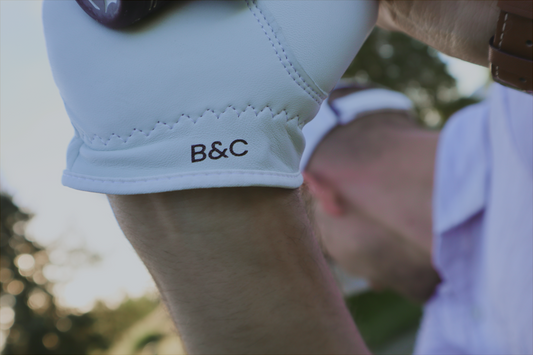 Close-up of the B&C logo on a golf glove