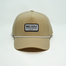 Load image into Gallery viewer, Front view of the B&amp;C Golf Rope Hat in Desert Tan.
