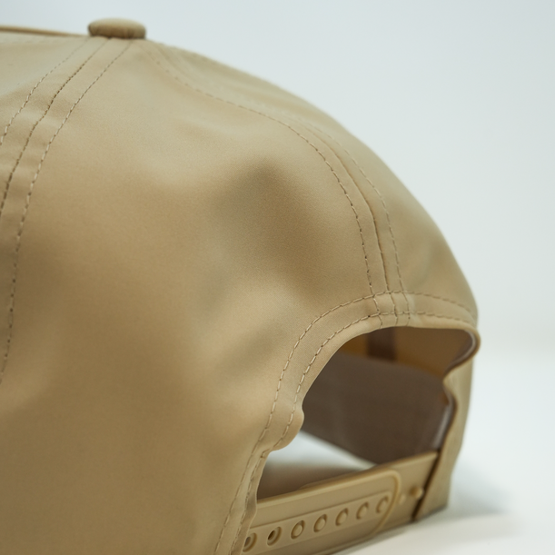 Backwards view of the snapback of the B&C Desert Tan Rope Hat.