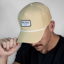 Load image into Gallery viewer, Brett wearing a B&amp;C Golf Desert Tan Golf Hat
